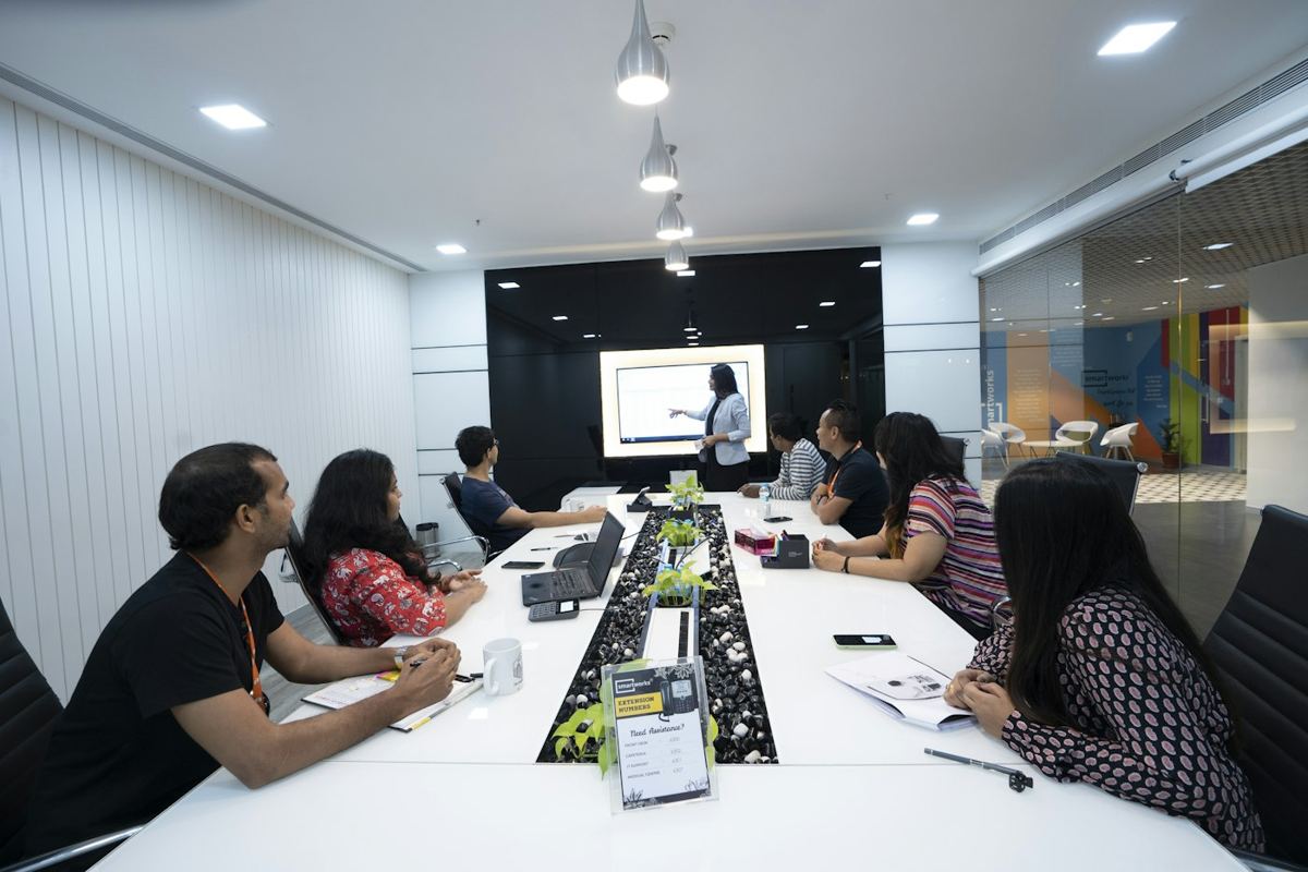 An HR team reviewing a presentation in an Indian office